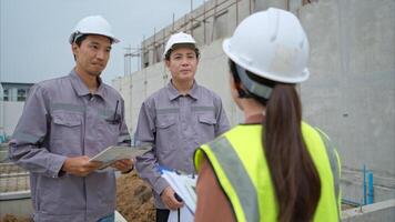 Group of engineers and architecture inspect and supervise the construction of building walls,85 photo