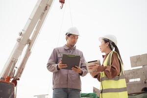 Engineers and architecture inspect and supervise the construction of building walls,60 photo