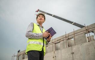 Engineers construction projects inspect and supervise the construction of building walls,44 photo
