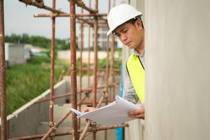 Engineers construction projects inspect and supervise the construction of building walls,17 photo