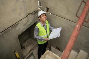 Engineers construction projects inspect and supervise the construction of building walls,11 photo