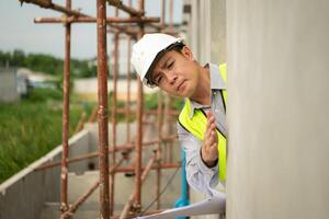 Engineers construction projects inspect and supervise the construction of building walls,6 photo