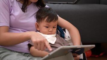 While in vacation at home, a mother engages in activities with little kid,331 photo