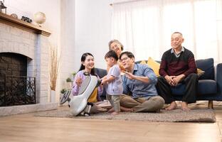 Happy multi-generational Asian family enjoying quality time together at home,12 photo