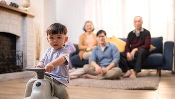 Happy multi-generational Asian family enjoying quality time together at home,5 photo