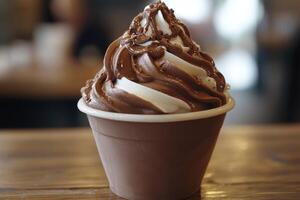 Chocolate and vanilla ice cream swirl sitting on a table photo