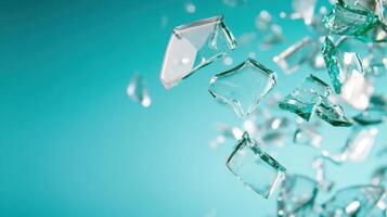 Shattered Glass Against Teal Background photo
