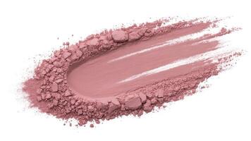 Close up of a pink powder cosmetic smear on a white background studio shot view photo