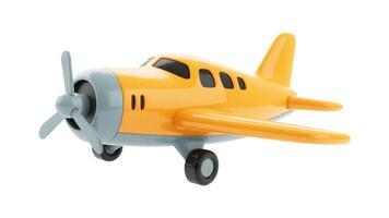 A close up of a yellow and gray toy airplane with a propeller on a white background shot in studio photo