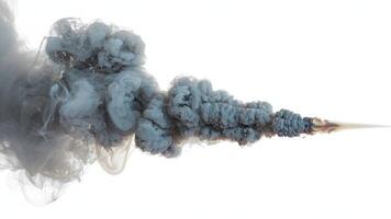 A horizontal shot of a plume of gray smoke against a bright white background in studio shot photo