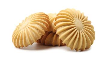 A close up view of several butter cookies stacked together on a white surface photo