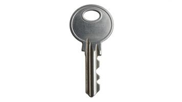 Isolated silver metal key with an oval opening on a white background in a studio shot photo