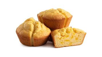 Isolated view of three corn muffins on a white background with one cut in half photo