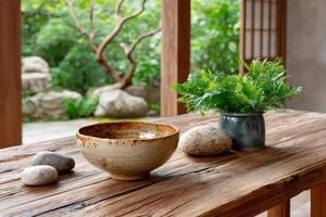 Japanese tea ceremony setting with ceramic bowl and green plant on wooden table photo