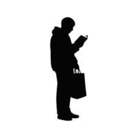 Silhouette of a man reading a book while carrying a shopping bag vector
