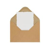 Envelope. Kraft paper with blank card isolated on white background. Copy space. Stock photo. photo