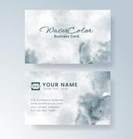 Cool-toned watercolor effects in a clean business card layout. vector