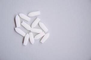 Pills on light background. photo