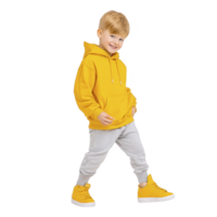 A cheerful young boy wearing bright yellow hoodie and gray sweatpants, paired with matching yellow sneakers, poses confidently against transparency background png