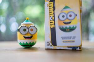 Samut Prakan, Thailand - June 18, 2025 Cute figurine of new blind box or random box, Action Figure Minion from Miniso shop photo