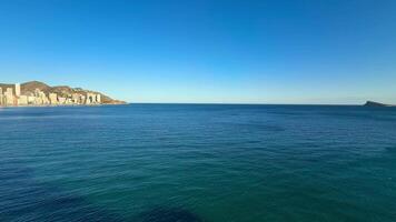 Stunning and gorgeous panoramic shots showcase tranquil ocean waters seamlessly merging with the skyline photo