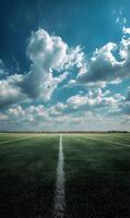 Infinite expanse a mesmerizing view of a field stretching towards the horizon beneath a vibrant sky filled with clouds photo