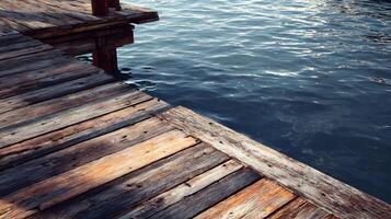 Wooden dock extending over tranquil water provides a peaceful and relaxing waterside view photo