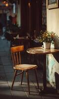 Serene cafe setting with empty chair and small table awaiting customers for coffee and conversation photo
