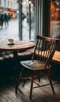 Rustic charm and tranquil moments a coffee cup awaits on a weathered table by the window photo