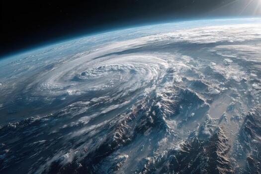 A massive storm system develops over the planet's surface, revealing swirling clouds and detailing mountainous terrain in the twilight photo