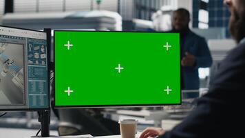 Professional expert looks at isolated screen examines high tech solar energy production, reviewing insights for clean power improvements and smart infrastructure planning. Camera B. photo