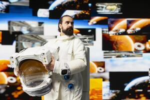 Modern man astronaut drifting in zero gravity during a space journey, reflecting interstellar adventure, celestial wonder and the future of astronautics and planetary discovery. Space craft. photo
