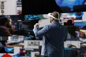Tech savvy professional uses virtual reality glasses to see social media platforms, using cloud based applications to reflect global connection and AI driven influence for engagement. photo