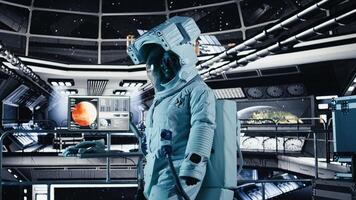 Female astronaut in spacesuit checks wrist device inside spacecraft doing human expansion in space. Starship crew member prepares for operations supporting long term mankind survival photo