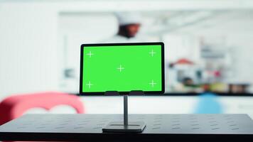Chroma key tablet and digital interface connecting users to entertainment networks. Isolated screen device in front of visualization of interconnected social media feeds photo