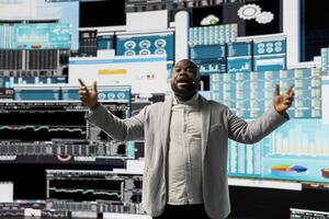 African american public speaker business coach hosting dynamic presentation with a live audience, building new fruitful strategy at a convention. Growth ideas and forecasting in business event. photo