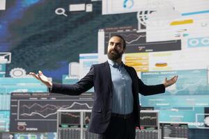 Unstoppable entrepreneur being confident with his successful business, looking around at fruitful performance metrics and insight. Feeling pride about his corporate legacy, empowerment. photo