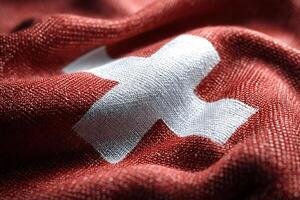 Swiss flag waving in the wind, a symbol of switzerland photo