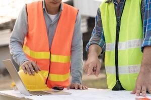 engineer and owner project is inspect construction and quality assurance new house. Engineers or architects or contactor work to build the house before handing it over to the homeowner photo