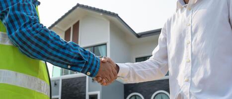 Construction team hands shaking greeting start up plan new project contract in office center at construction site, industry ,architecture, partner, teamwork, agreement, property. contacts photo