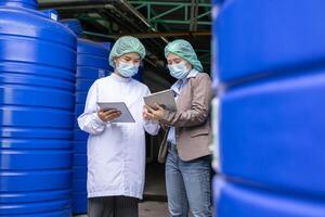 Factory food or beverages, engineer or inspector check quality water for production line, check PH parameters of water on process. Quality control or assurance, Good standard, Healthy photo