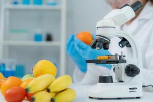 Scientist check chemical food residues in laboratory. Control experts inspect quality of fruits, vegetables. lab, hazards, ROHs, find prohibited substances, contaminate, photo
