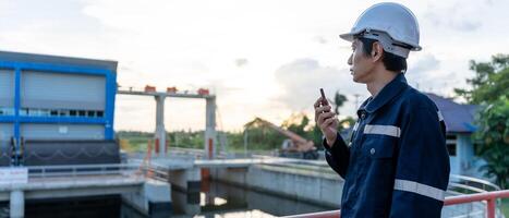 Maintenance engineers are using walky talky to inform the results of inspection of buildings and structures. Irrigation engineers are exploring sluice systems photo