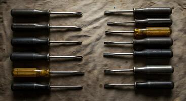 Arrangement of Flathead Screwdrivers on Fabric Background Mechanic's Tools photo