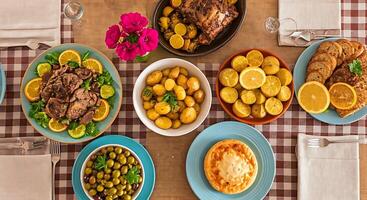 A table with many plates of food on it photo