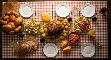 Fresh Home Cooked Meal Table with Roasted Meat Potatoes Salads Bread and Drinks photo