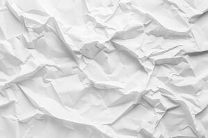 A textured background showcases a beautifully crumpled white paper, inviting creativity and imagination for artistic expressions and design projects photo
