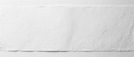 A blank white paper texture serves as a tranquil backdrop, inviting endless creativity and opportunities for expression in artistic endeavors photo