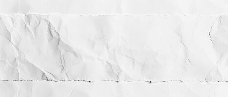Crisp white paper showcases subtle wrinkles and creases, offering a versatile background for artistic projects or elegant presentations photo