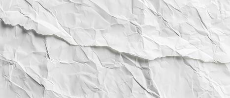 A textured surface of crumpled white paper provides a unique canvas for artistic expressions, ideal for design and creative projects photo